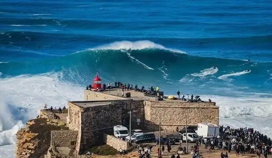 Nazaré ocean viewpoint and fishing village – stop on Porto to Lisbon guided road trip