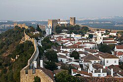 Medieval castle and cobblestone streets of Óbidos – stopover on private transfer Porto to Lisbon